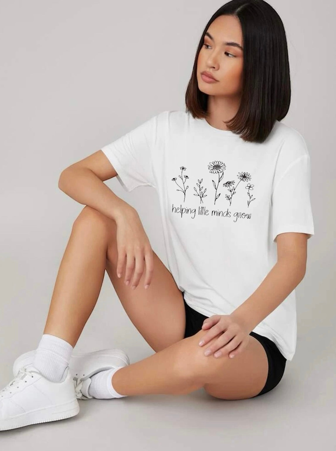 Aider les petits esprits à grandir - T-shirt